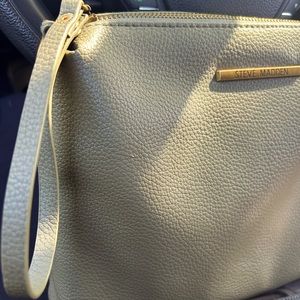 Women’s olive green large Steve Madden clutch with wristlet.